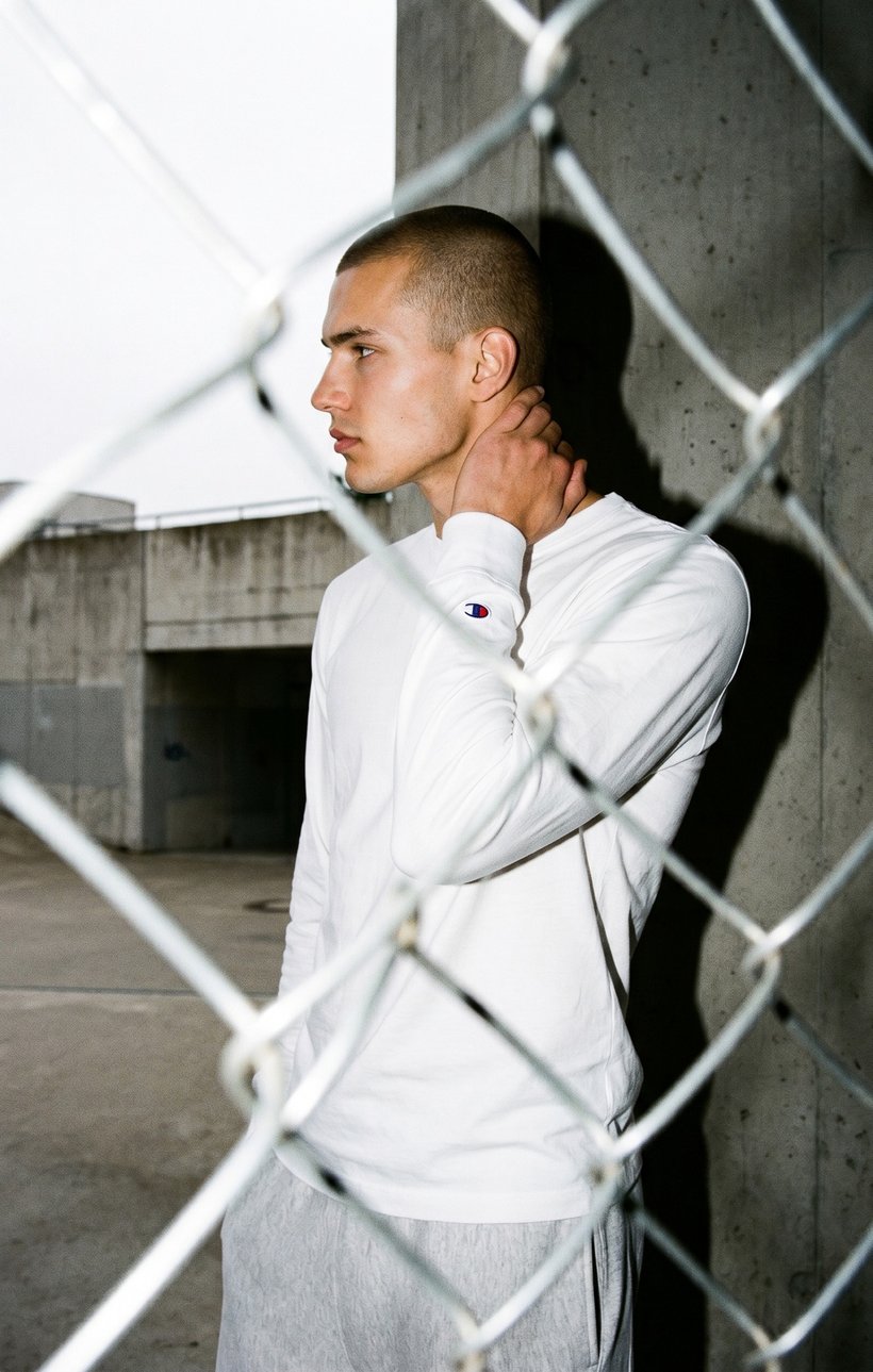 Champion Youth — light hoodie by the fence