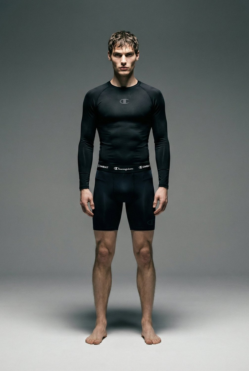 Champion — editorial, black compression set, full figure