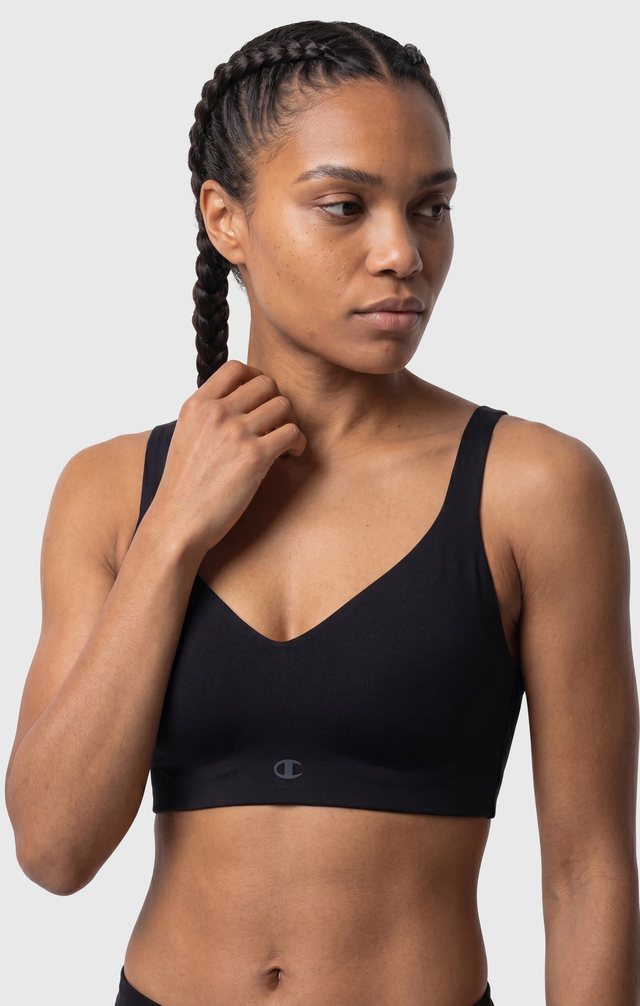 Champion — PDP-01 · Close-up, black sports bra and shorts