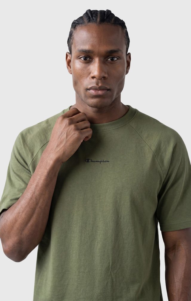 Champion — PDP-04 · Close-up, green tee